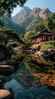 Scenic mountain retreat with traditional architecture by a tranquil river at sunrise photo