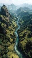 Lush green hills and winding river create breathtaking landscape in remote mountainous region during daytime photo