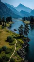 Scenic river winding through mountains and forests during a clear day in a natural landscape photo