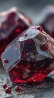 Crimson crystal formations glisten under soft light showcasing deep red hues and intricate textures photo