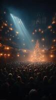 Crowd gathers in a grand theater to celebrate Christmas while a beautifully lit tree takes center stage photo
