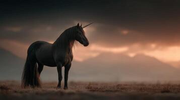Majestic black unicorn standing in a serene landscape under a dramatic sky during twilight hours photo