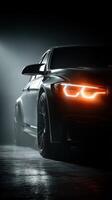 Sleek sports car illuminated in a dimly lit garage showcasing modern design and powerful performance photo