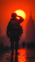 Soldier salutes against a vibrant sunset in an urban landscape, reflecting bravery and solitude during twilight photo