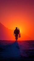 Soldier walks with American flag at sunset in a dramatic landscape highlighting courage and patriotism photo