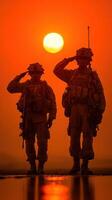 Soldiers salute at sunset, honoring their commitment and service in a poignant moment of reflection and camaraderie photo