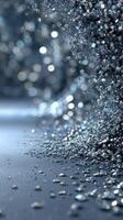 Shimmering particles scatter across a smooth surface under soft ambient light creating an enchanting atmosphere photo