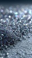 Shimmering collection of colorful glitter scattered on a smooth surface photo