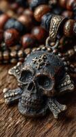 Pirate-themed necklace featuring a skull and crossbones pendant detailed against a rustic wooden background photo