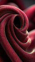 Beautiful close-up of deep red fabric showcasing intricate textures and folds in soft light at twilight photo