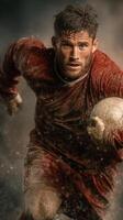 Intense soccer player sprinting on muddy field with a ball during a competitive match at sunset photo
