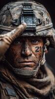 Soldier saluting with determination in a dusty battlefield at dawn photo