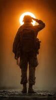 Soldier saluting against a dramatic sunset highlighting courage and dedication in military service photo
