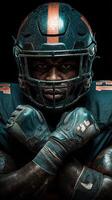 Football player showcasing determination in dramatic lighting during a game preparation moment at a stadium photo