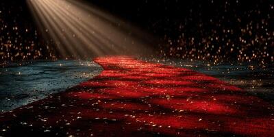 Red carpet pathway illuminated by warm light with sparkling bokeh effect in a dimly lit venue photo