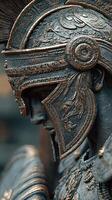Detailed metal sculpture of a warrior from ancient history showcasing a helmet and intricate armor with emotional expression photo