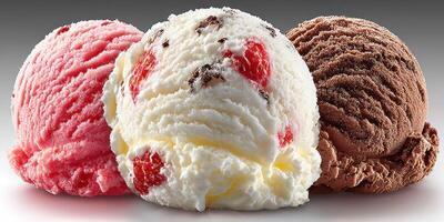 Colorful scoops of ice cream in three flavors served together in a tempting dessert display photo