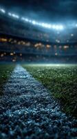 Rainy football match takes place at a dimly lit stadium with vibrant floodlights illuminating the field photo
