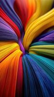Vibrant strands of colorful materials twist and flow in striking patterns with rich texture photo