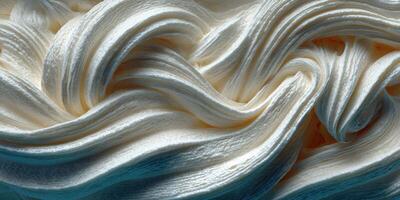 Creamy textured frosting swirls beautifully on a dessert serving at a bakery in the afternoon light photo