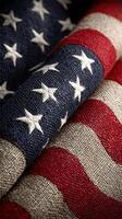 Textile featuring American flags in different textures and colors during a close-up view photo