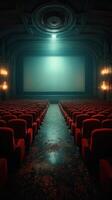 Vintage cinema interior with empty red seats and a large screen illuminated by soft light photo