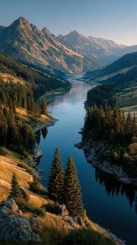 Serene river flows through mountain valley at dawn with reflections on calm water photo