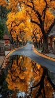 Stunning autumn landscape with vibrant yellow trees reflecting in a tranquil puddle on a peaceful road photo