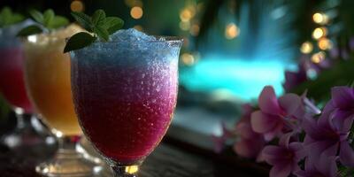 Colorful mocktails served in elegant glasses beside a beautiful pool with floral accents at a tropical evening gathering photo