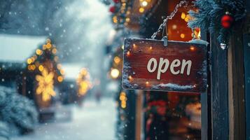 A sign that says open on a snowy street photo