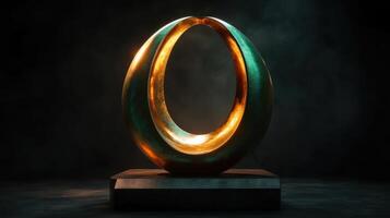 A golden sculpture on a black background photo
