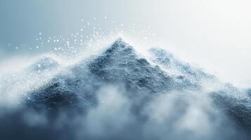 A mountain with snow and fog on it photo