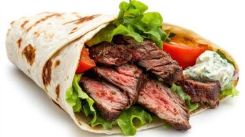 Grilled beef wrap with lettuce and tomatoes on white background photo