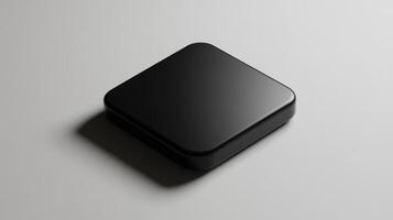 A black square box sitting on a table photo