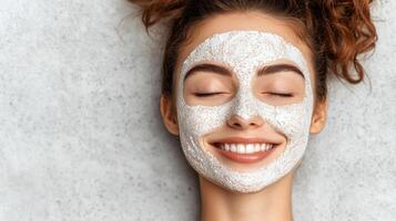 A woman with a face mask on her face photo