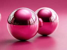 Two shiny pink spheres reflect a window, casting soft shadows on a smooth surface. The spheres display a glossy finish, with a gradient from light to dark pink, enhancing their elegance photo