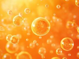 Translucent bubbles of various sizes float against a vibrant orange backdrop, creating a bright and lively scene. The image presents a sense of freshness and energy photo