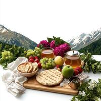 A tray with fruit, bread, tea and a bowl of fruit photo