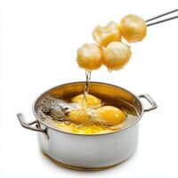 A pan with eggs being fried photo