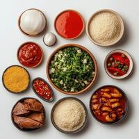 Various bowls of food on a white surface photo