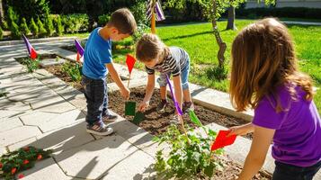 Three children planting flowers in a garden photo