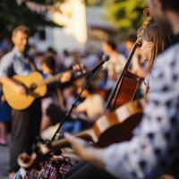 A group of people playing music in an outdoor setting photo