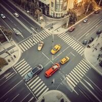 An aerial view of cars at a crosswalk photo