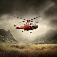 A red helicopter flying over a field with mountains in the background photo
