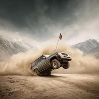 A suv is jumping over a mountain with a flag photo