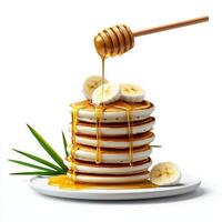 A stack of pancakes with bananas and honey photo