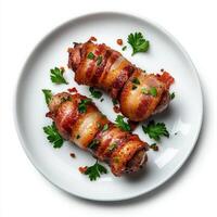 Bacon wrapped in bacon on a plate photo