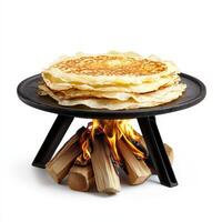 A stack of pancakes on a black plate photo