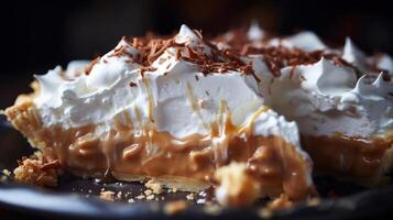 A slice of pie with whipped cream and caramel photo