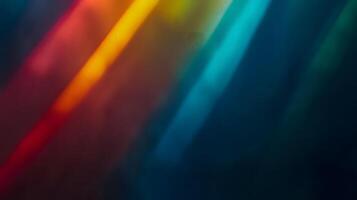 Abstract blurred colorful light streaks across a smooth dark background creating a dynamic texture photo
